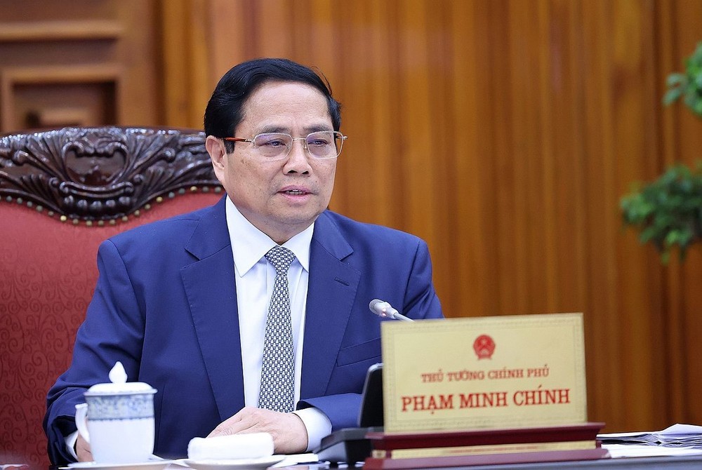 政府总理范明政主持会议。（图：越通社）