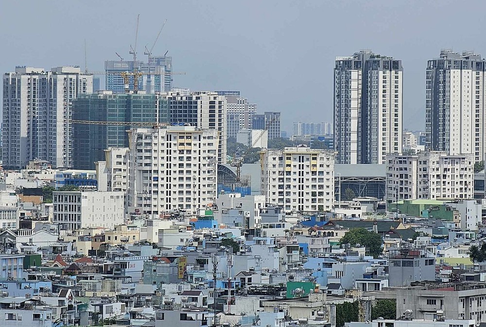 本市约有2万份卷宗具备签发粉红簿条件，但开发商和购房者缓慢办理手续。