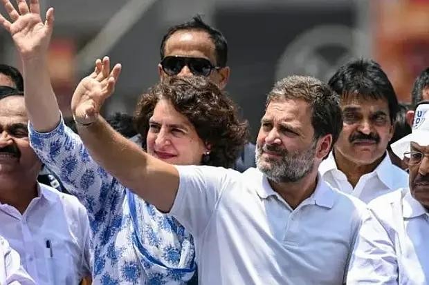 印度国大党领袖拉胡尔·甘地向支持者挥手致意。(图：AFP)