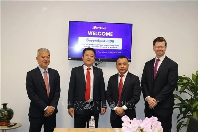 双方代表合影。（图：越通社）