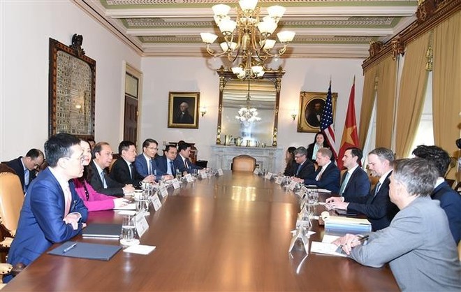 双方会见场景。（图：越通社）