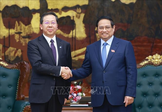 范明政总理接见中国华电科工集团有限责任公司董事长彭刚平。（图：越通社）