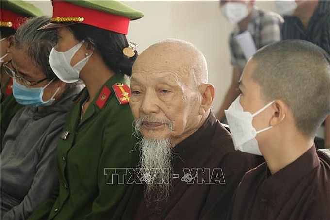 出庭受审的被告黎松云