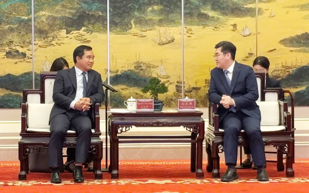 Chủ tịch UBND TPHCM Nguyễn Văn Được tại buổi làm việc với Thị trưởng Thành phố Quảng Châu Tôn Chí Dương. Ảnh: TRẦN HÙNG