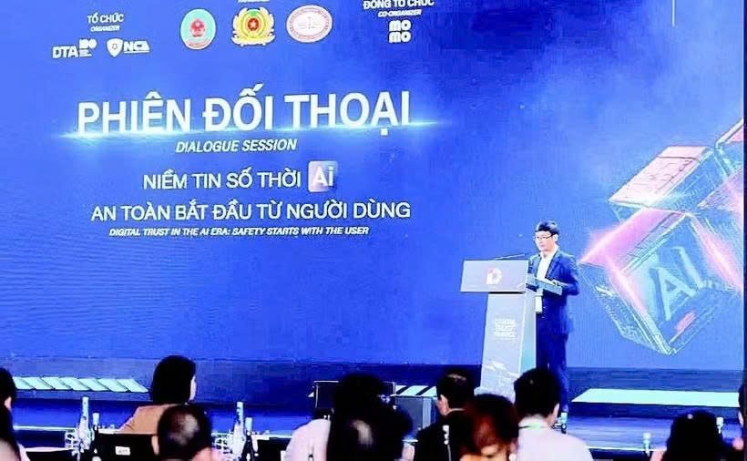 以“在人工智能（AI）时代构建金融数字信任”为主题的2026金融数字信任论坛现场。图自nhandan.vn