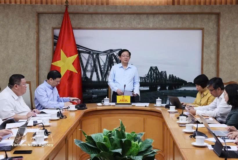 政府副总理胡国勇在政府驻地主持与科技部、财政部的会议，旨在统一国内生产总值中数字经济的衡量指标。图自越通社