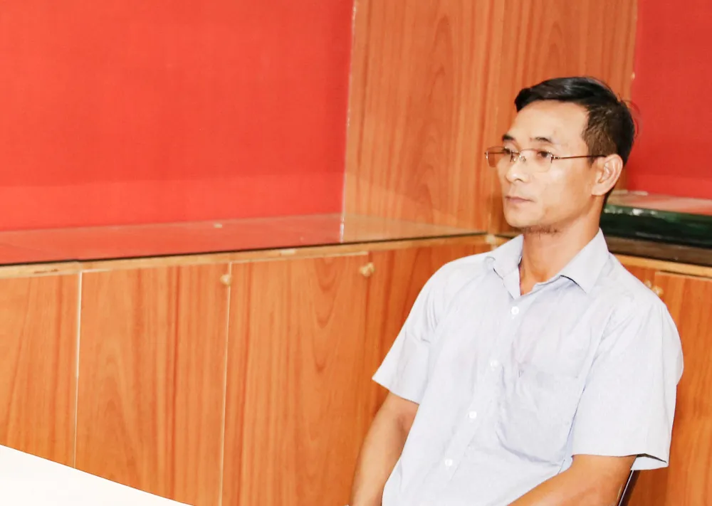 Đối tượng Nguyễn Văn Chí tại cơ quan Công an.jpg