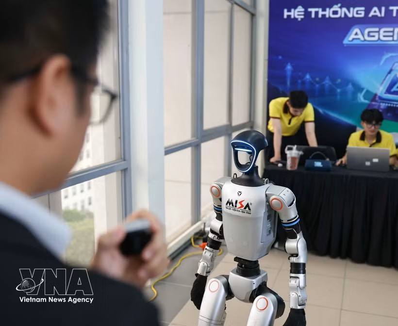 在2026年人工智能日活动（AI Day 2026）的产品展示与推介区域，越南正通过这一平台集中展现其在全球AI硬件供应链中日益提升的地位。图：越通社