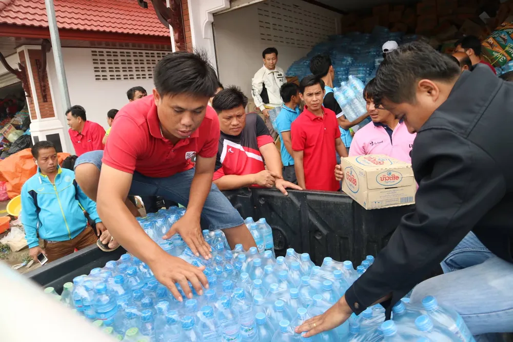 Lực lượng cứu hộ quốc tế đổ về Lào cứu trợ sau vụ vỡ đập thủy điện ảnh 6