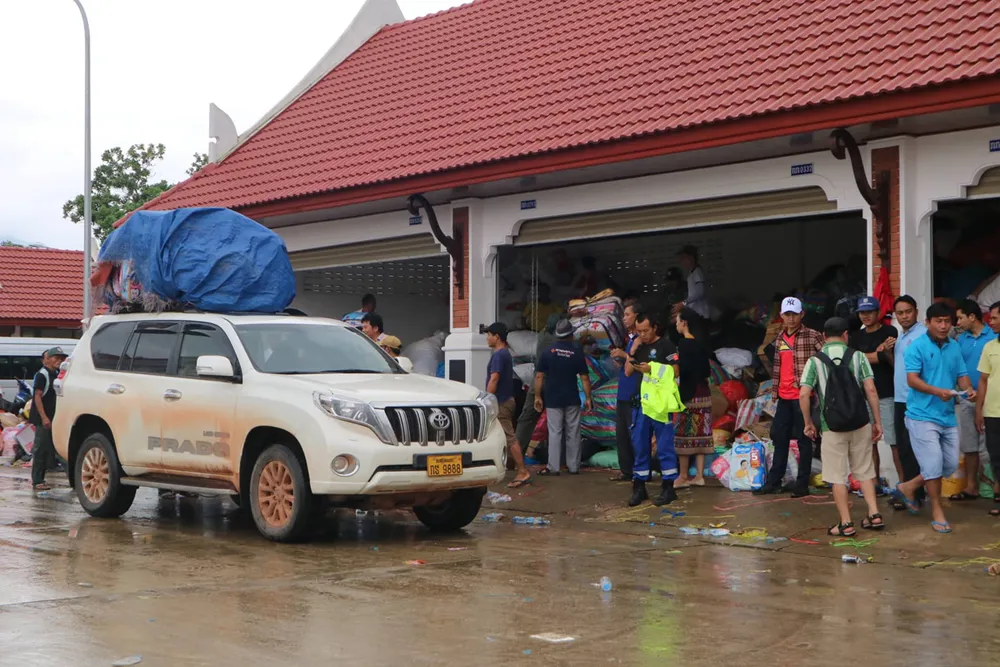 Lực lượng cứu hộ quốc tế đổ về Lào cứu trợ sau vụ vỡ đập thủy điện ảnh 9