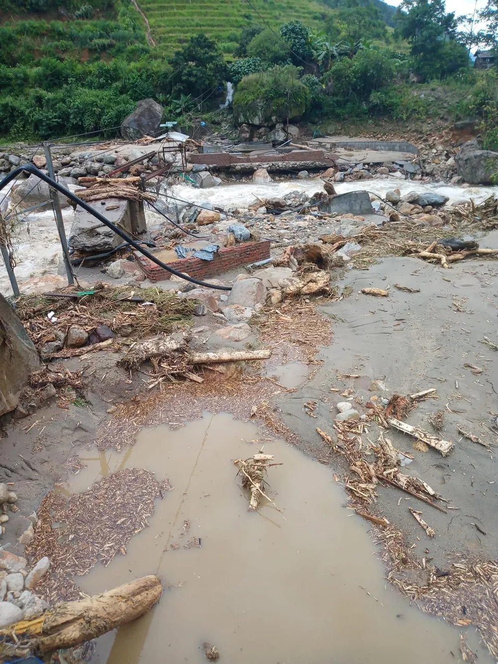 Lũ quét tan hoang tại xã Liên Minh, thị xã Sa Pa đêm 12 đến sáng 13-9 Lũ quét tan hoang tại xã Liên Minh, thị xã Sa Pa đêm 12 đến sáng 13-9