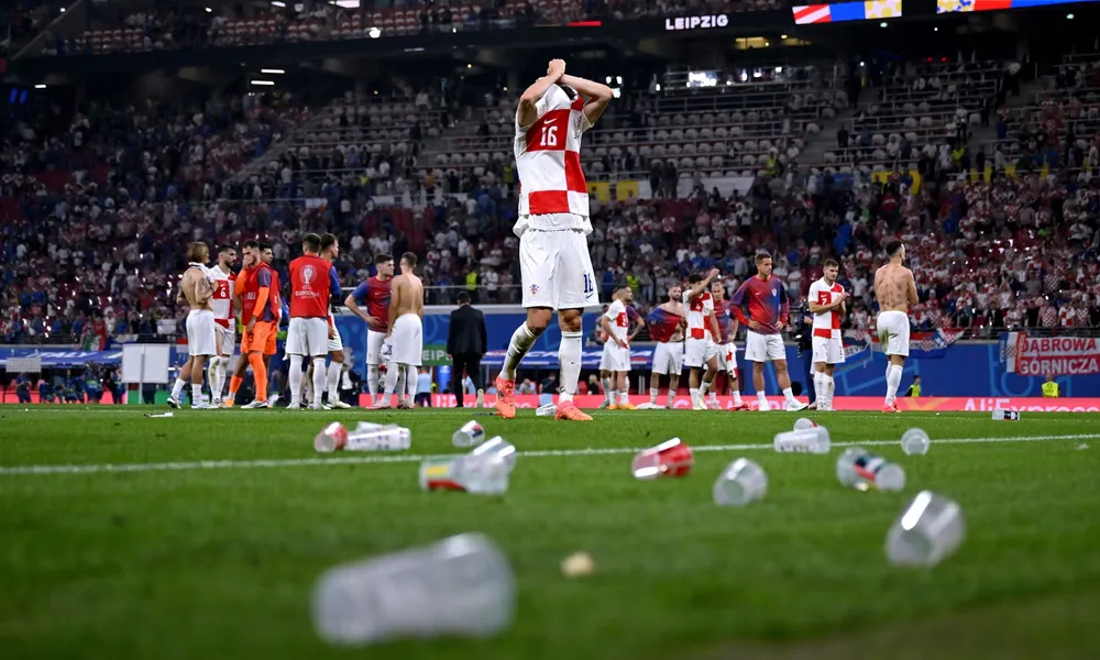 Plastic-beer-cups-line-the-pitch-after-Croatia’s-game-against-Italy.jpg