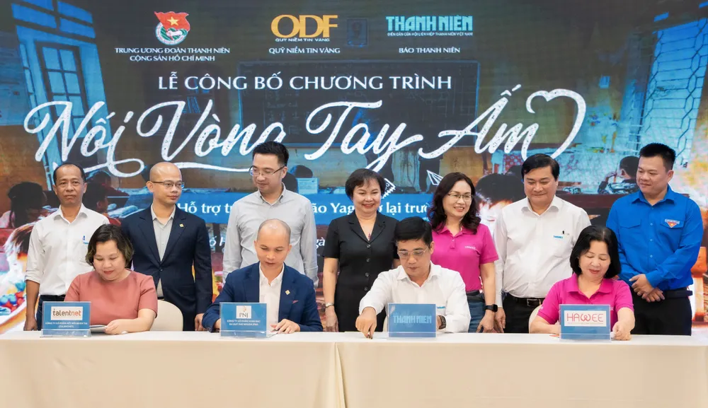 Các đơn vị thực hiện ký kết hỗ trợ chương trình Nối vòng tay ấm.jpg