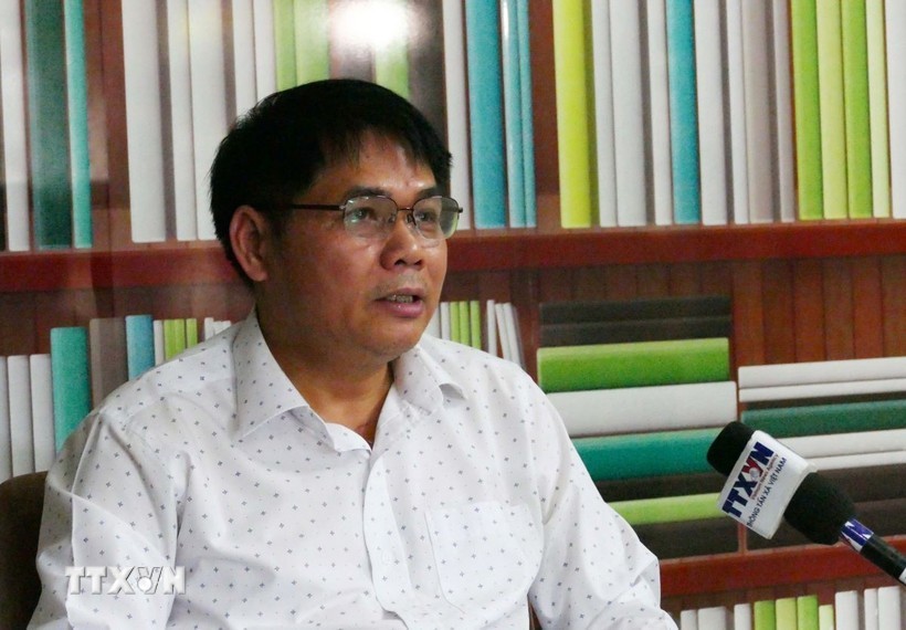 在老越南企业协会副主席黄文军。 