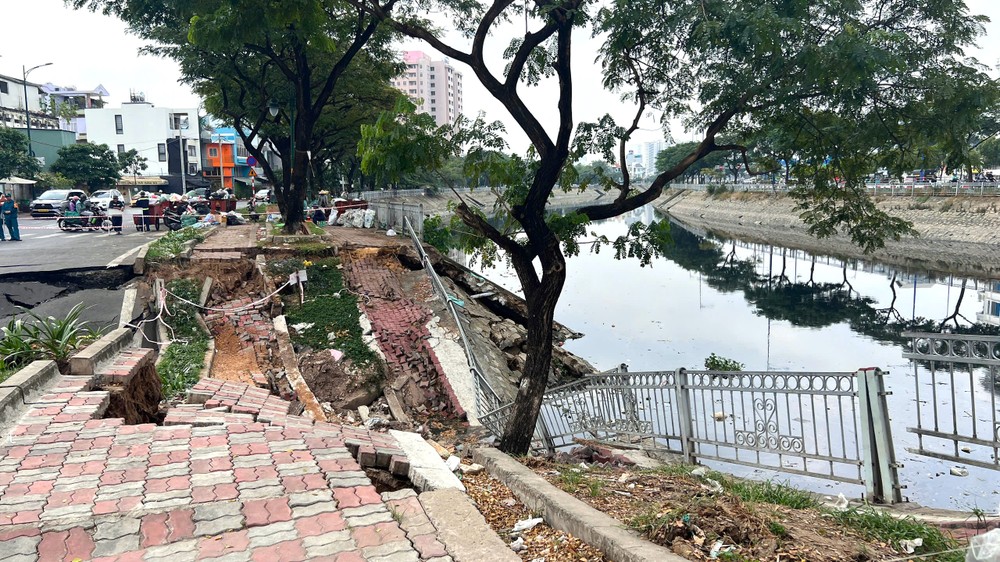 豆腐涌塌陷、人行道断裂的画面。