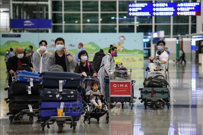 中国香港国际机场的旅客。资料图：法新社/越通社（第三方不得使用、分享）
