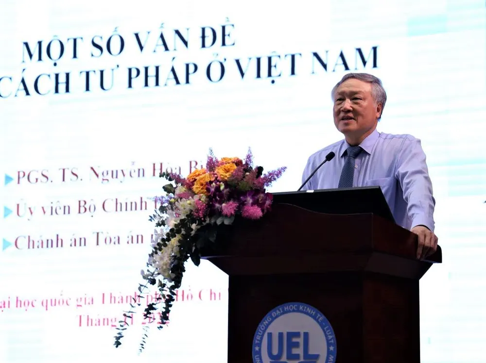 Chánh án Tòa án nhân dân Tối cao nói chuyện với sinh viên, giảng viên ĐH Quốc gia TPHCM ảnh 1