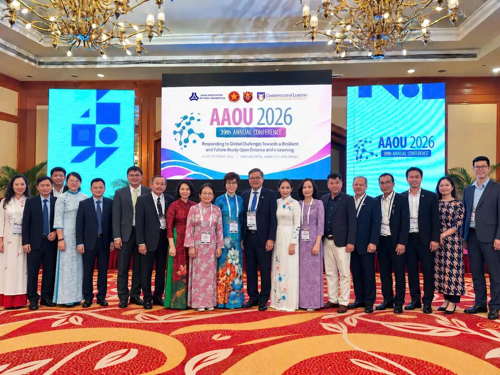 Hai trường đại học mở của Việt Nam tham gia tại hội nghị - Ảnh: MINH TIẾN