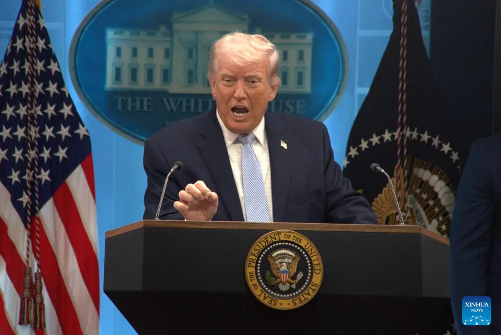 Tổng thống Mỹ Donald Trump tại buổi họp báo. Ảnh: XINHUA 