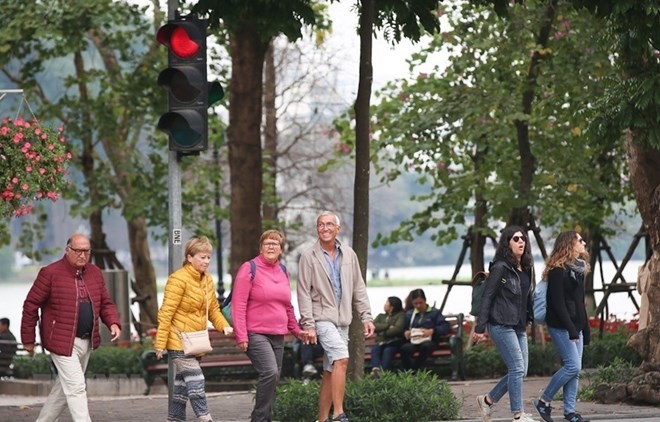 Foreign visitors to Hanoi (Photo: VNA)