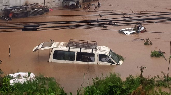 Flood triggered by heavy rains in Kathmandu, Nepal, on July 12 (Photo: Xinhua/VNA)
