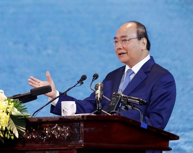 Prime Minister Nguyen Xuan Phuc delivers a speech at the national conference in Nam Dinh province on October 19 (Photo:VNA)