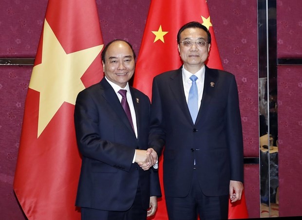 PM Nguyen Xuan Phuc holds meetings on ASEAN Summit’s sidelines ảnh 1