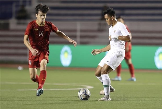 SEA Games 30: Vietnam score thrilling 2-1 comeback win over Indonesia ảnh 2