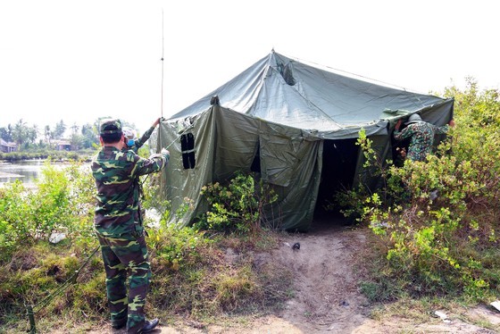 Border guard forces strive to control Covid-19  ảnh 1