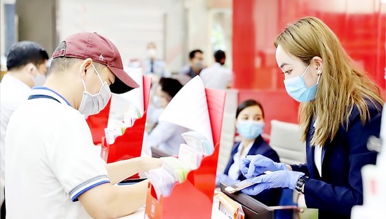 Securities companies buying out bank bonds ảnh 1