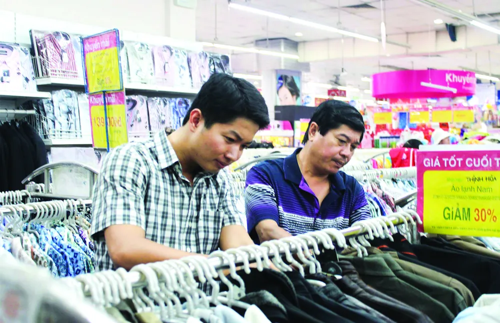 Bắt đầu giảm giá hàng hóa tết trên cả nước ảnh 2