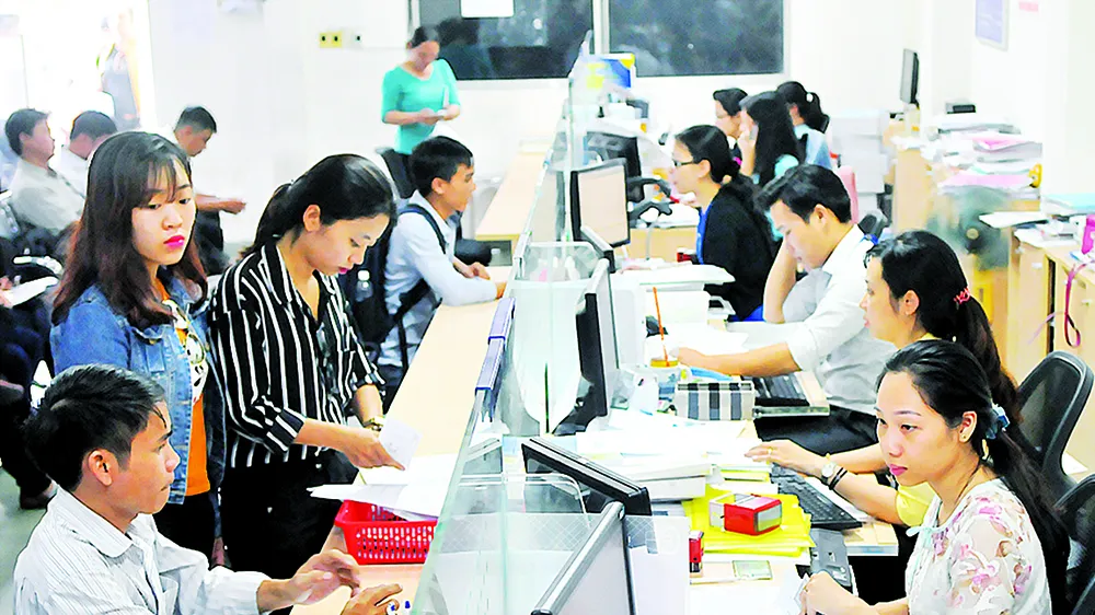 Giải quyết hồ sơ đăng ký kinh doanh tại Sở Kế hoạch và đầu tư TPHCM                        Ảnh: CAO THĂNG