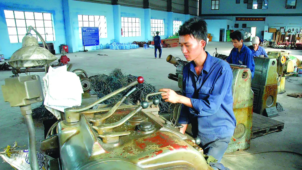 Doanh nghiệp nhỏ và vừa đang gặp khó khăn về vốn, công nghệ sản xuất...  để phát triển. Ảnh:  Cao Thăng