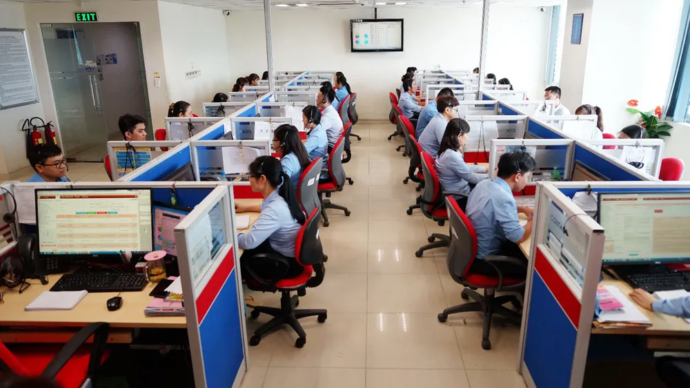 Trung tâm Chăm sóc khách hàng 1900545454 tiếp nhận các nhu cầu về điện của khách hàng          Ảnh: CHI LAN