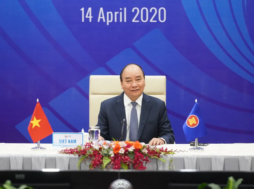 Thủ tướng  Nguyễn Xuân Phúc, Chủ tịch ASEAN 2020,  phát biểu  tại Hội nghị trực tuyến Cấp cao đặc biệt ASEAN về ứng phó dịch Covid-19.  Ảnh: QUANG PHÚC
