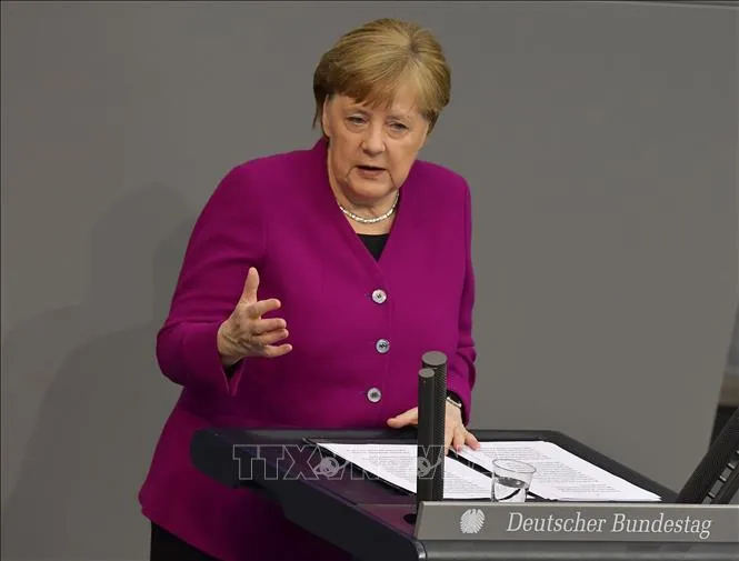 Thủ tướng Đức Angela Merkel phát biểu trong cuộc họp dịch về COVID-19 tại Berlin, ngày 23/4/2020. Ảnh: AFP/TTXVN