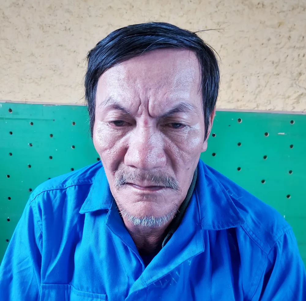 Lê Văn Nhầy tại cơ quan công an. Ảnh: CTV Lê Văn Nhầy tại cơ quan công an. Ảnh: CTV