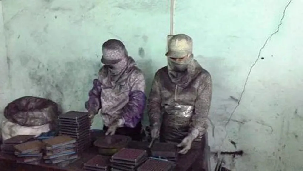 Bắt thêm 1 giám đốc trong vụ chế thuốc Vinaca từ bột than ảnh 1