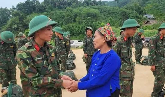 An emotional moment as soldiers bid farewell to the residents of Lang Nu Hamlet