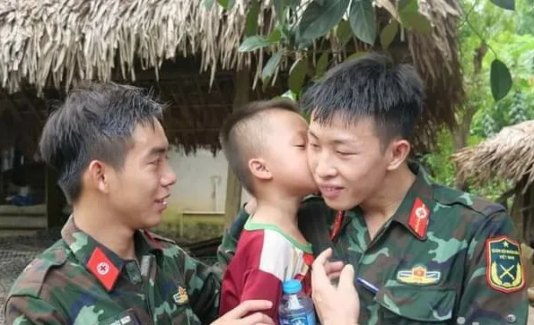 An emotional moment as soldiers bid farewell to the residents of Lang Nu Hamlet