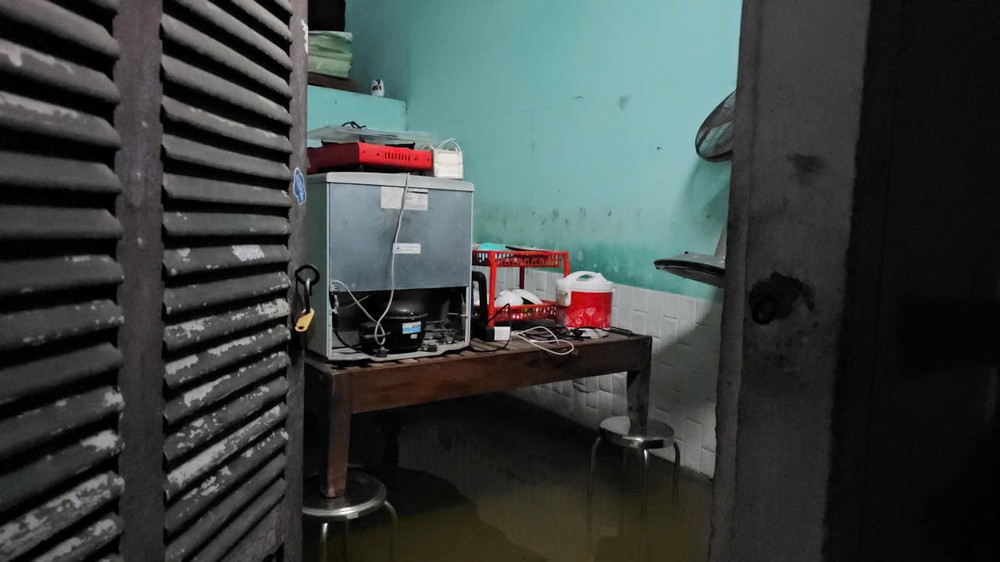 Belongings are moved to higher places to avoid floodwaters.