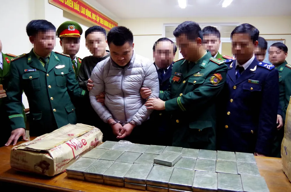 Bắt quả tang đối tượng vận chuyển 120 bánh heroin ảnh 4