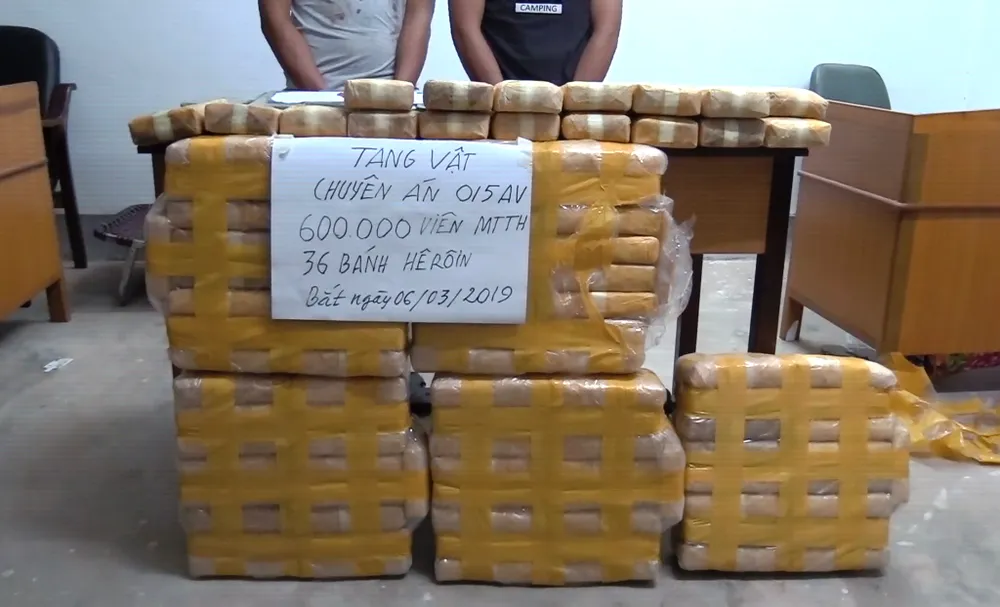 CLIP: Chặt đứt đường dây vận chuyển 600.000 viên ma túy và 36 bánh heroin từ Lào về Việt Nam ảnh 1