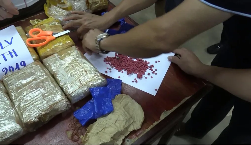Triệt phá vụ vận chuyển 62.000 viên ma túy từ Lào về Việt Nam ảnh 2