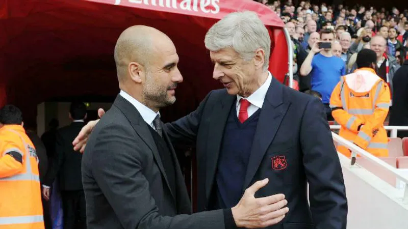 Pep Guardiola (trái) sẵn sàng cho chiến thắng trước Arsene Wenger. Ảnh: Getty Images