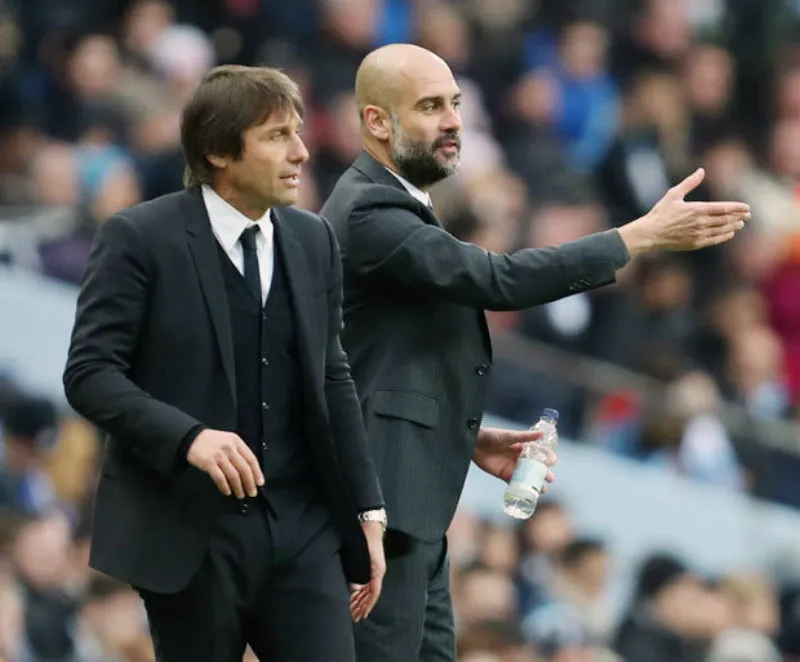 Antonio Conte (trái) không “ghen tị” với đồng nghiệp Pep Guardiola. Ảnh: Getty Images 