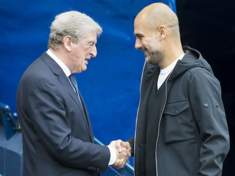 HLV Roy Hodgson (trái) tin tưởng Pep Guardiola và Man.City sẽ đăng quang. Ảnh: Getty Images 