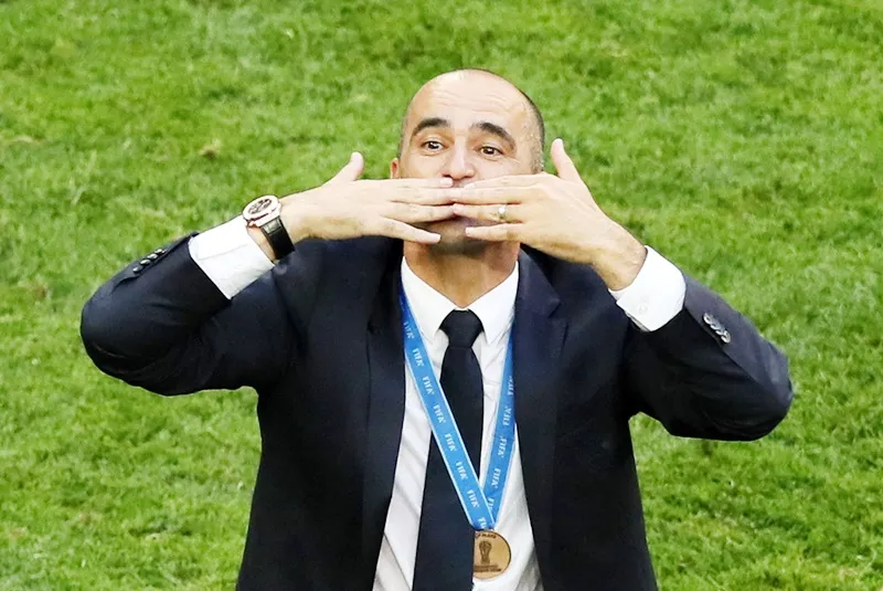 HLV Roberto Martinez ăn mừng hiến tích lớn lai của tuyển Bỉ. Ảnh: Getty Images