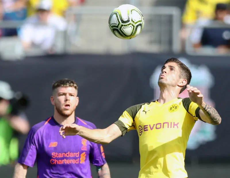  Christian Pulisic (phải) tỏa sáng càng thôi thúc nỗ lực của HLV Jurgen Klopp. Ảnh: Getty Images