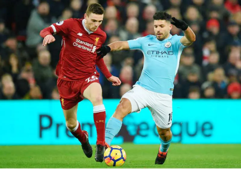 Andrew Robertson (trái) không ngán ngại đối đầu các ngôi sao lớn. Ảnh: Getty Images 